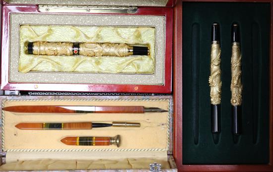 A collection of fountain pens and writing equipment
